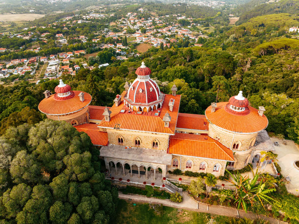 Aerial view of Monserrate Palace, its domes among lush gardens
